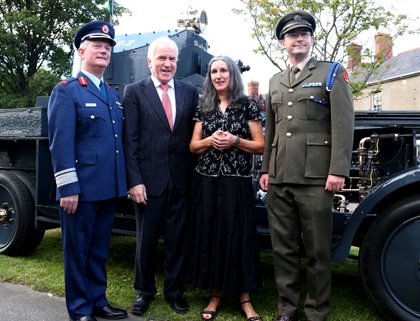 Maj. Gen. Ralph James (DCOS Ops), Minister Deenihan, Ms. Caitriona Crowe (National Military Archives) and Comdt. Padraig Kennedy (OIC Archives) in front of AAR 2 'Sliabh na mBan' (the 'Michael Collins armoured car)..